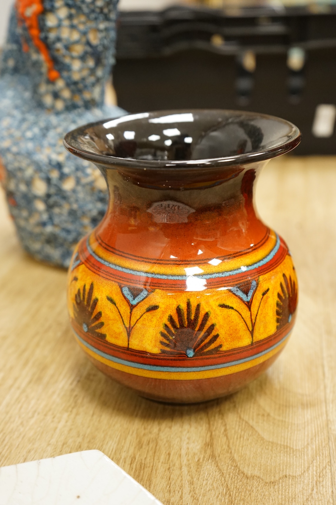 A collection of studio ceramics and pottery to include a Zsolnay vase and a Lyn Alves hexagonal dish
